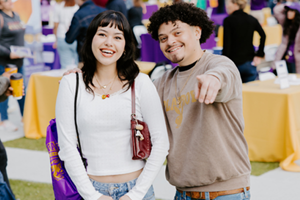 Two SF State students posing at Explore SF event
