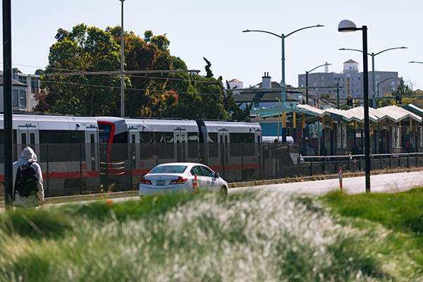 19th Avenue featuring a car and muni