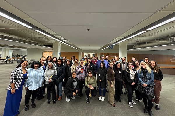 Alumni group photo after library tour