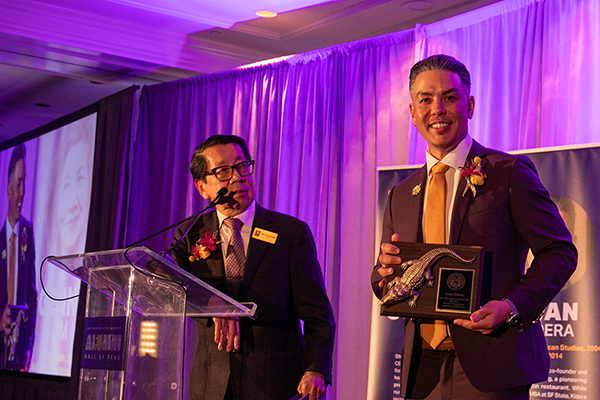 Evan Kidera accepting his SFSU Alumni Hall of Fame award