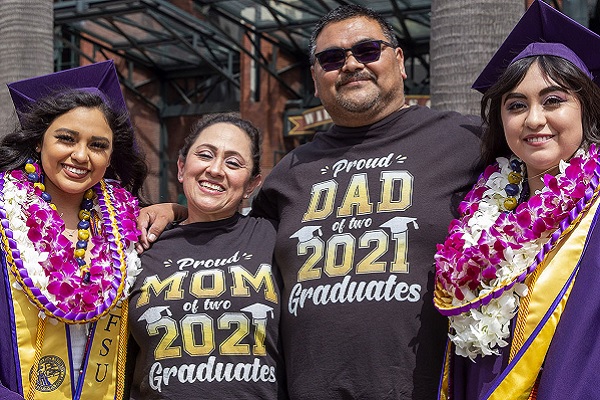 A family poses at Commencement