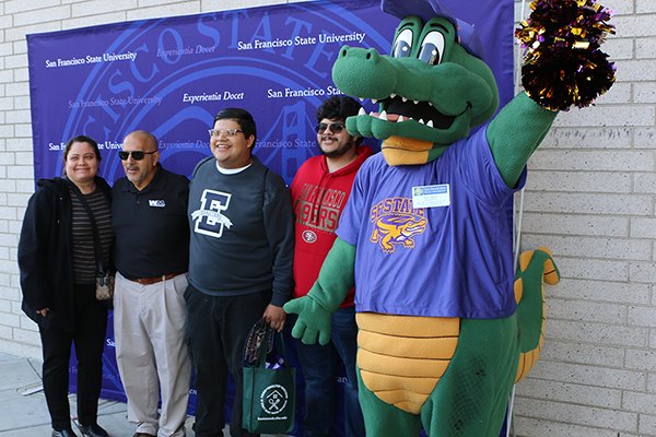 Parents and students with mascot Alli Gator