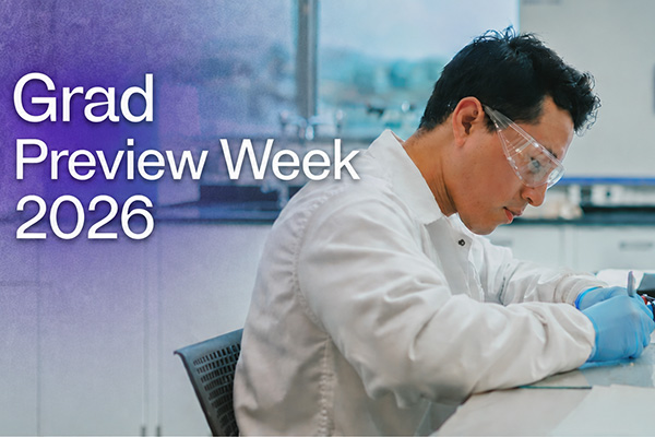 Lab student working on report with text over image "Grad Preview Week 2026"