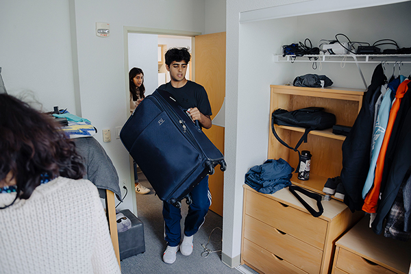 Students moving into their dorm