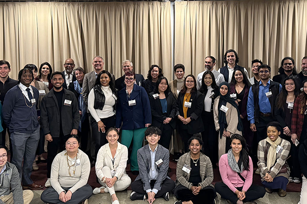 Alumni, University leaders and supporters of the President’s Leadership Fellows Program taking a group photo