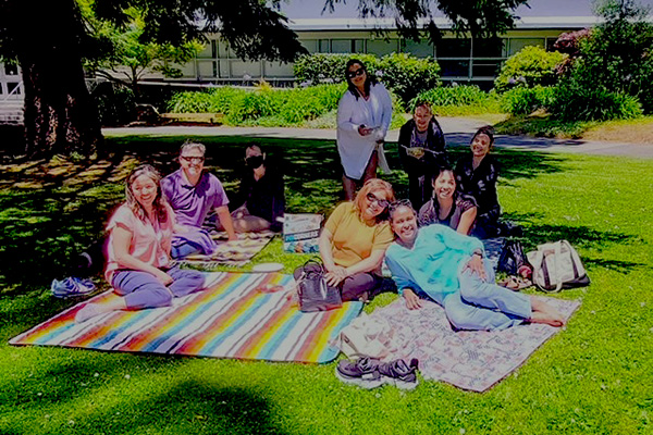 Nine SF State staff and faculty having a picnic