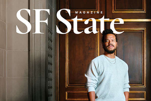 SF State magazine cover featuring alum at city hall grand entrance