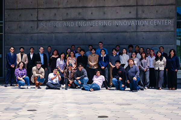 Engineering research community college students grouped together for a photo