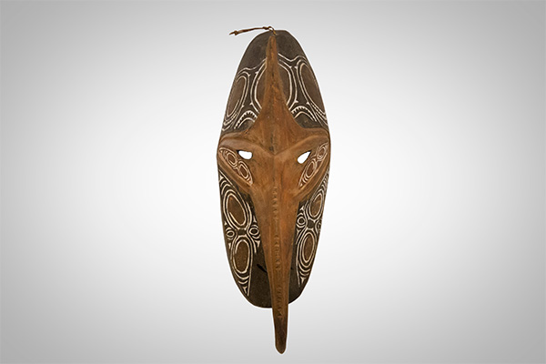 a mask artifact from the history exhibit: "The Land of the Unexpected"