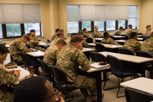 Students in military uniforms seated in a classroom