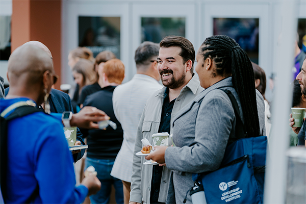 SFSU faculty chatting at toy drive event